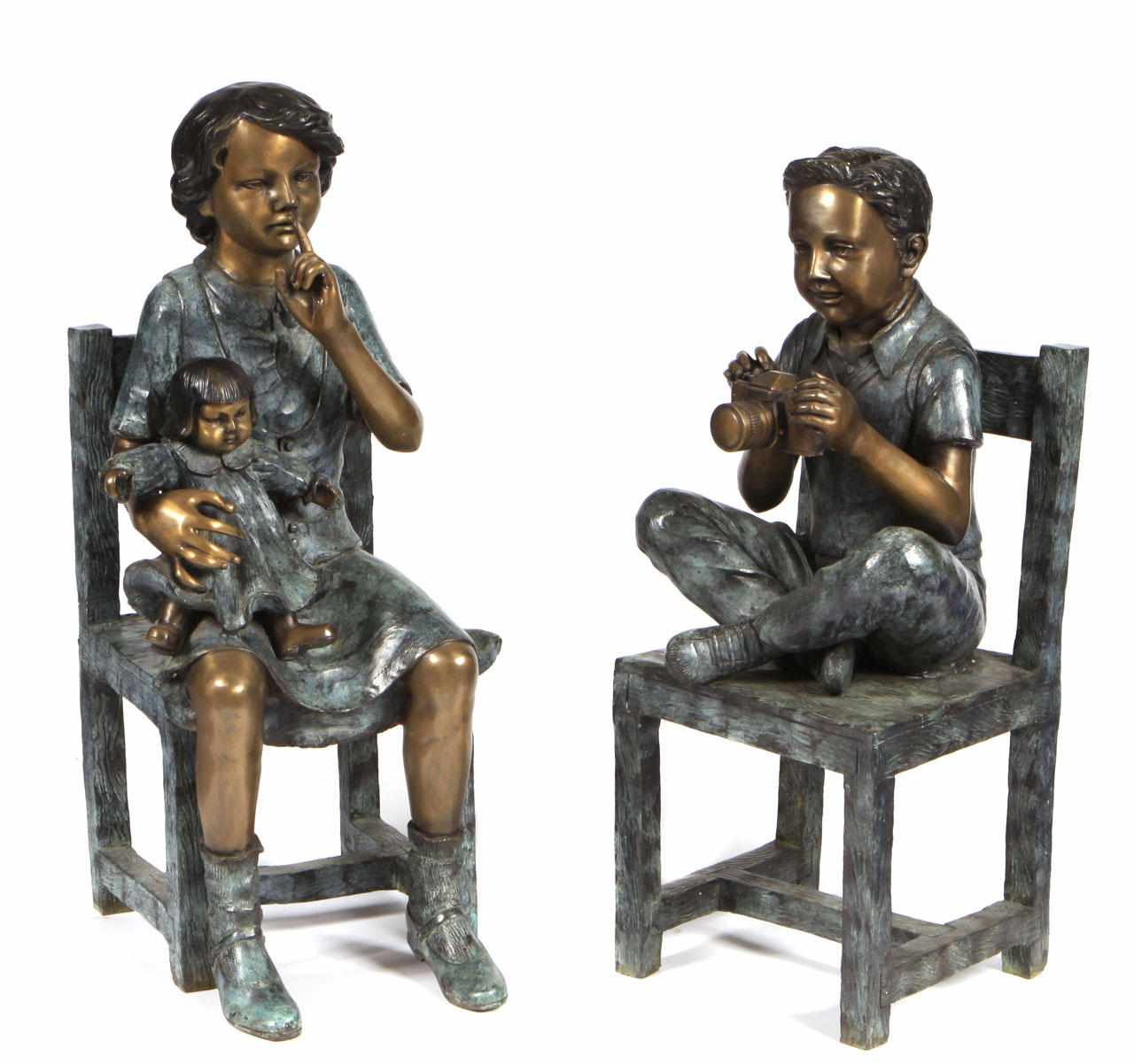 Appraisal: Property of various owners A pair of patinated bronze figures