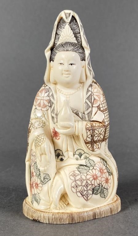 Appraisal: Carved ivory statue or figurine of an Asian figure with