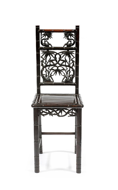 Appraisal: A Chinese rosewood side chair th Centurywith carved bamboo back