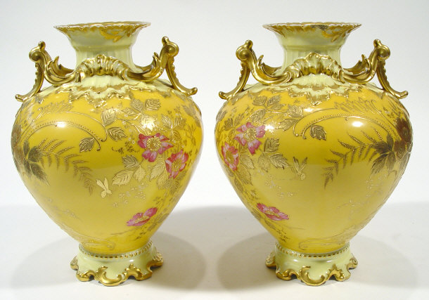 Appraisal: Pair of Limoges porcelain vases with ornate gilt handles and