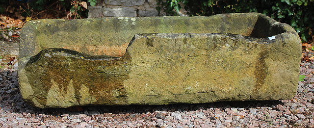 Appraisal: A RECTANGULAR CARVED STONE TROUGH AF cm long