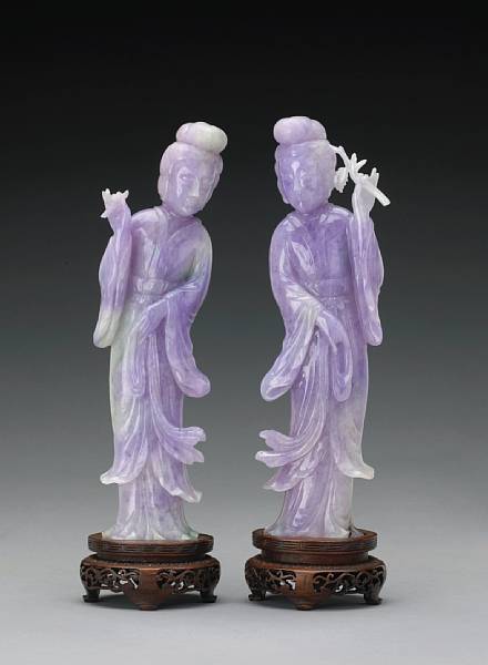 Appraisal: A pair of lavender jadeite maidens th Century Each beauty