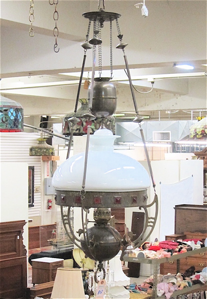 Appraisal: HANGING ELECTRIFIED KEROSENE LIGHT FIXTURE English c fitted with a