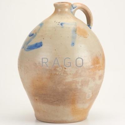 Appraisal: STONEWARE JUG Ovoid form with blue decoration x Condition Report