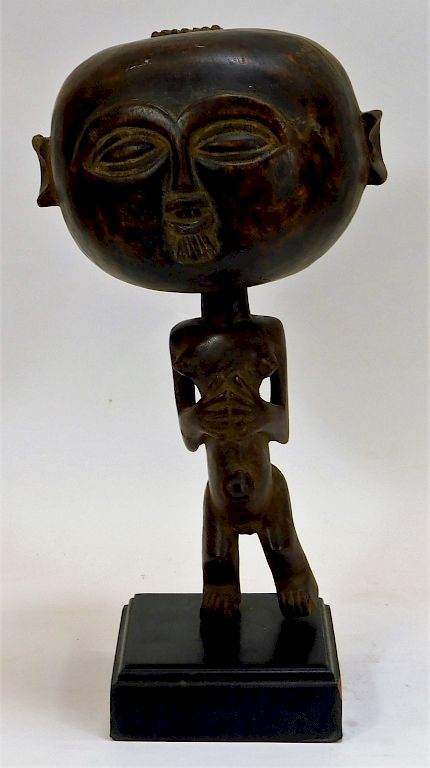 Appraisal: African Wood Carved Fertility Statue Rattle Africa th Century Figure