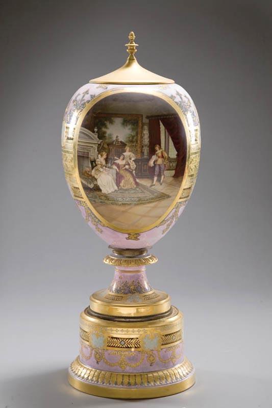 Appraisal: LARGE GILT AND HAND PAINTED URN Marked with an underglaze