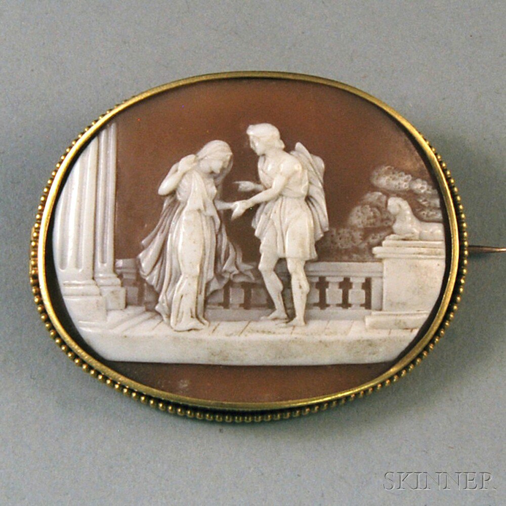 Appraisal: Low-karat Gold-framed Shell-carved Cameo Brooch depicting two Classical figures in