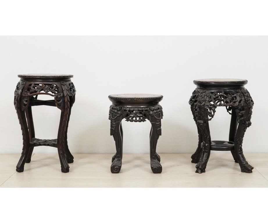 Appraisal: Three Asian carved plant stands late th c with marble