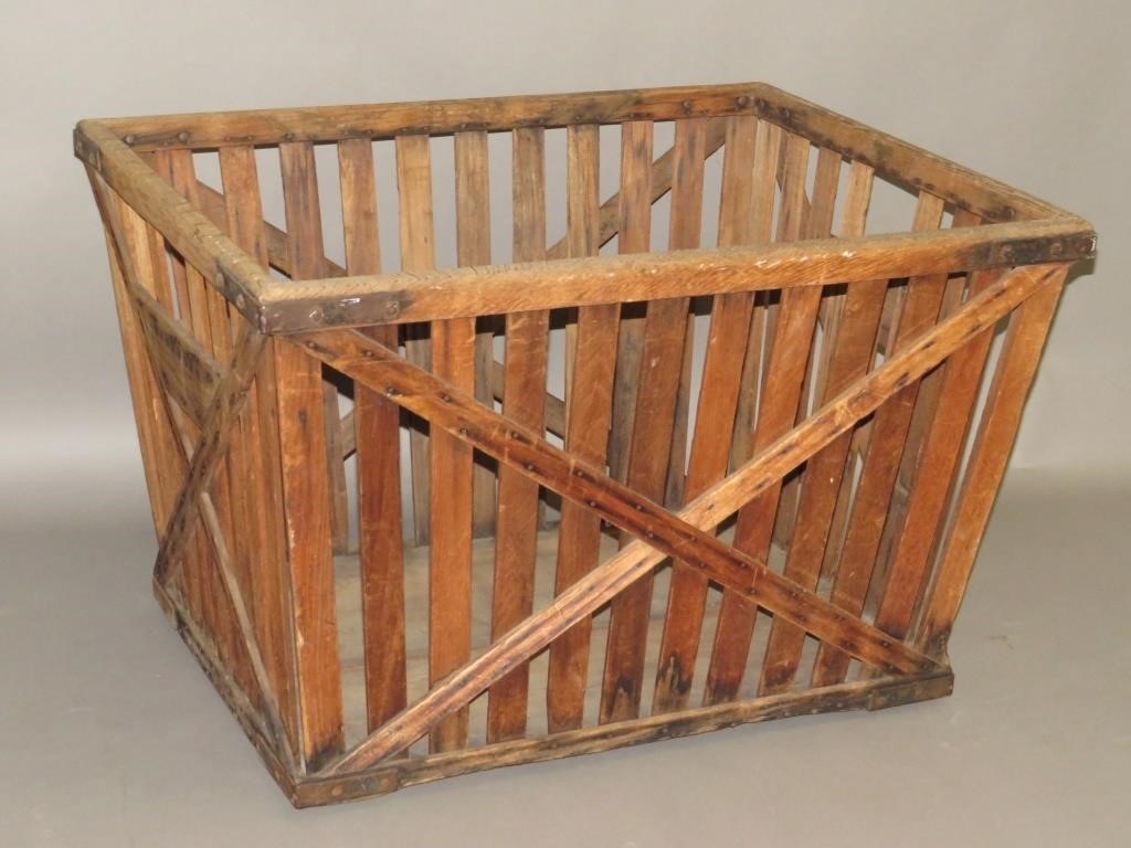 Appraisal: LAUNDRY BINca made of wood strips with X shaped reinforcements