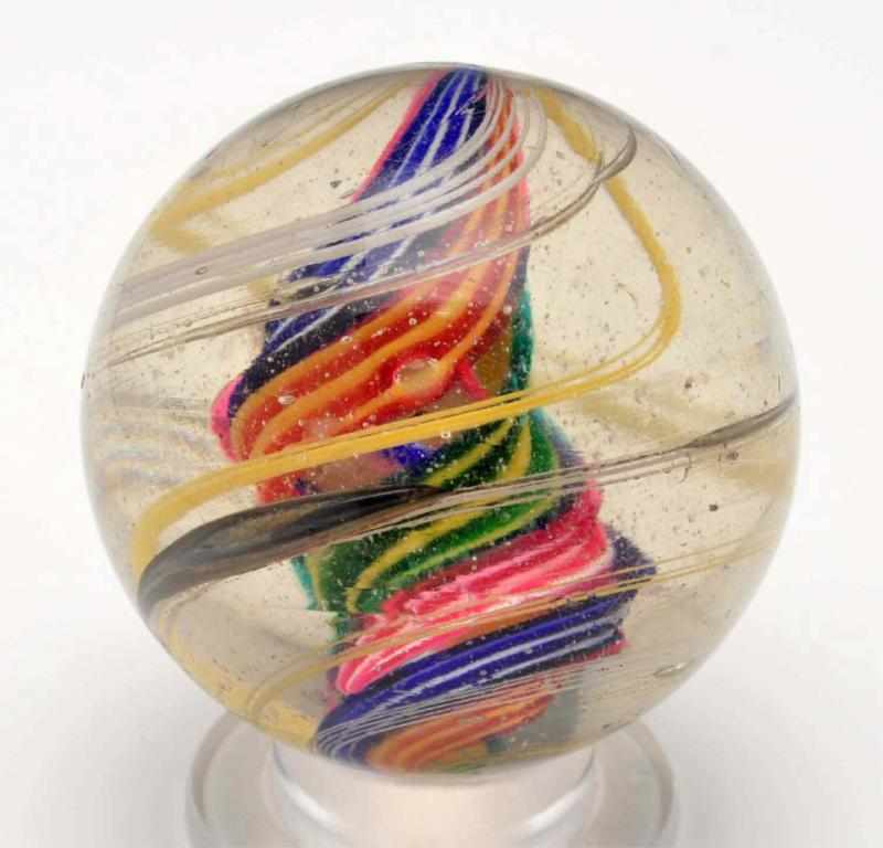 Appraisal: Divided Core Swirl Marble Description Multicolored divided core with a