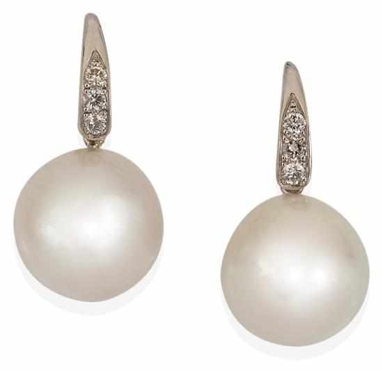 Appraisal: A PAIR OF SOUTH SEA PEARL AND DIAMOND EARRINGS Each