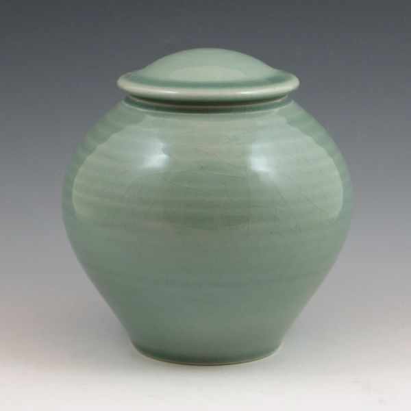 Appraisal: Turner studio pottery lidded jar in celadon green Signed Turner