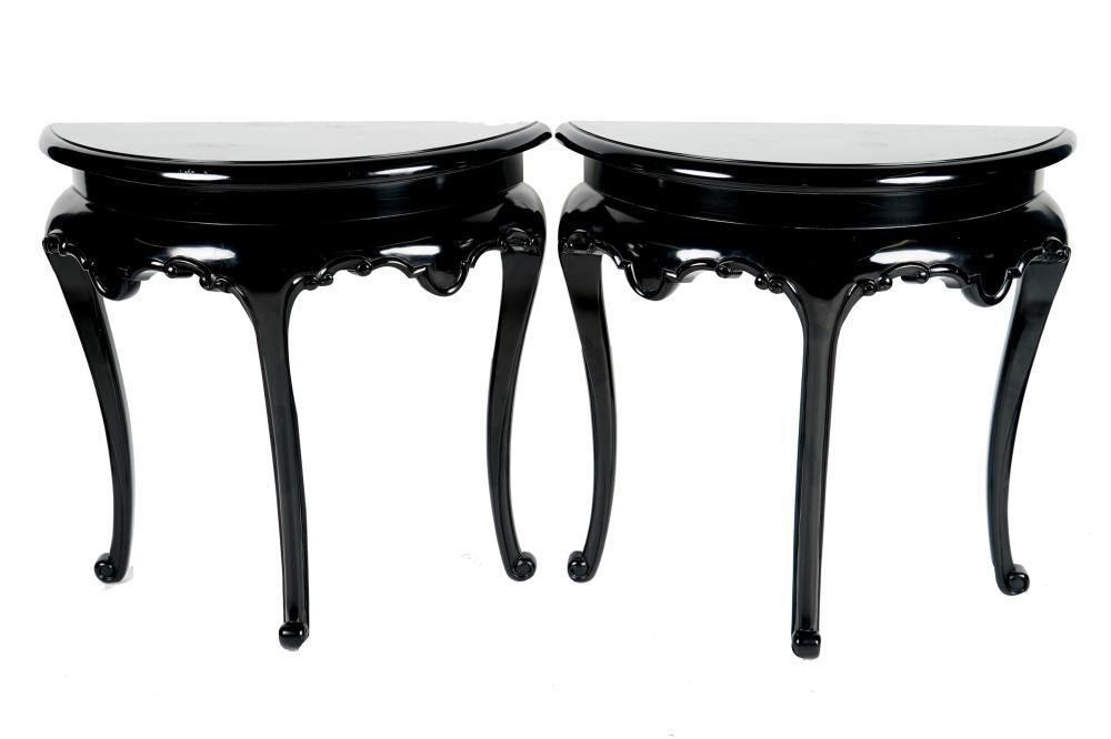 Appraisal: PAIR OF CHINESE EBONY DEMILUNE CONSOLE TABLESeach with three legs