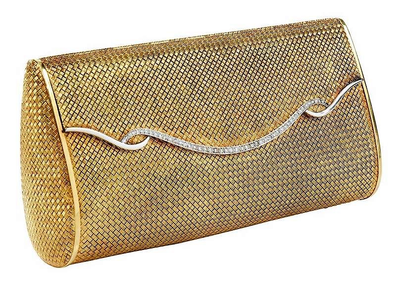 Appraisal: kt Gold Diamond Woven Clutch border with assorted cut diamonds