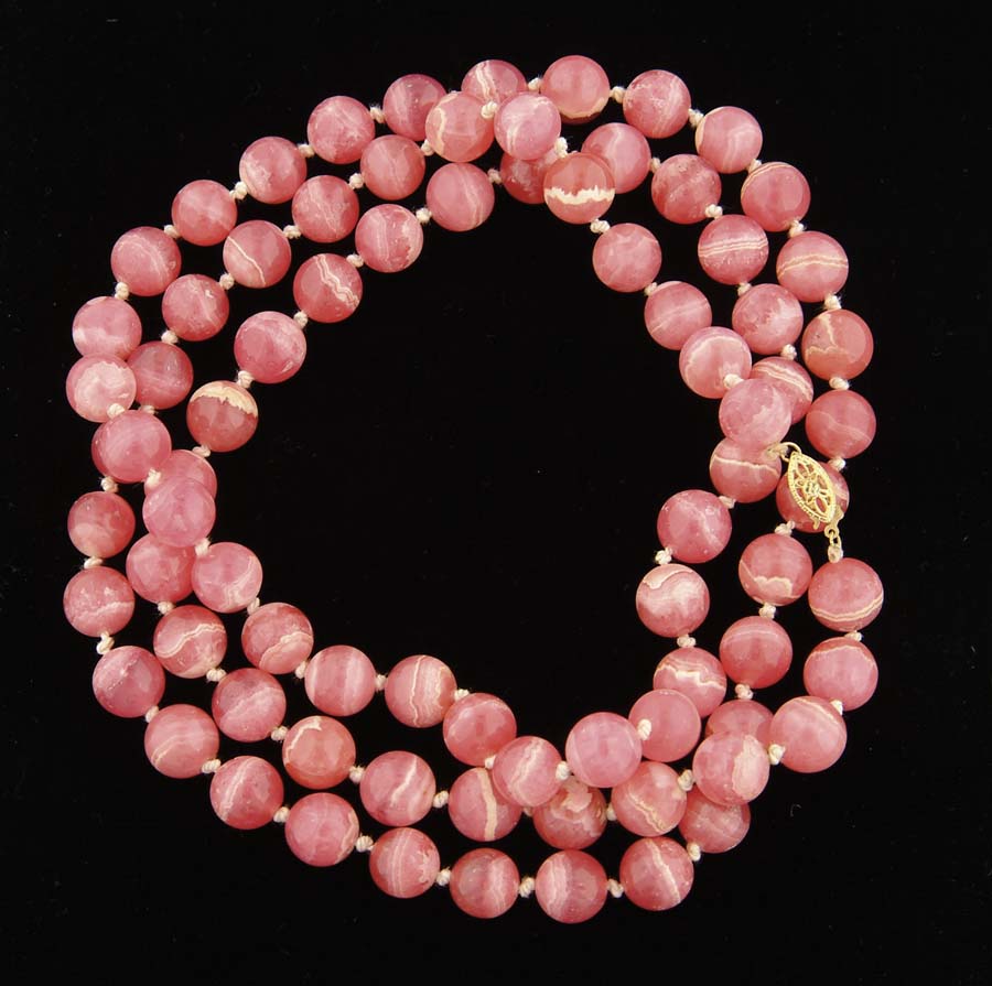 Appraisal: RHODOCHROSITE BEAD NECKLACE Eighty-one individually knotted rose colored mm Rhodochrosite