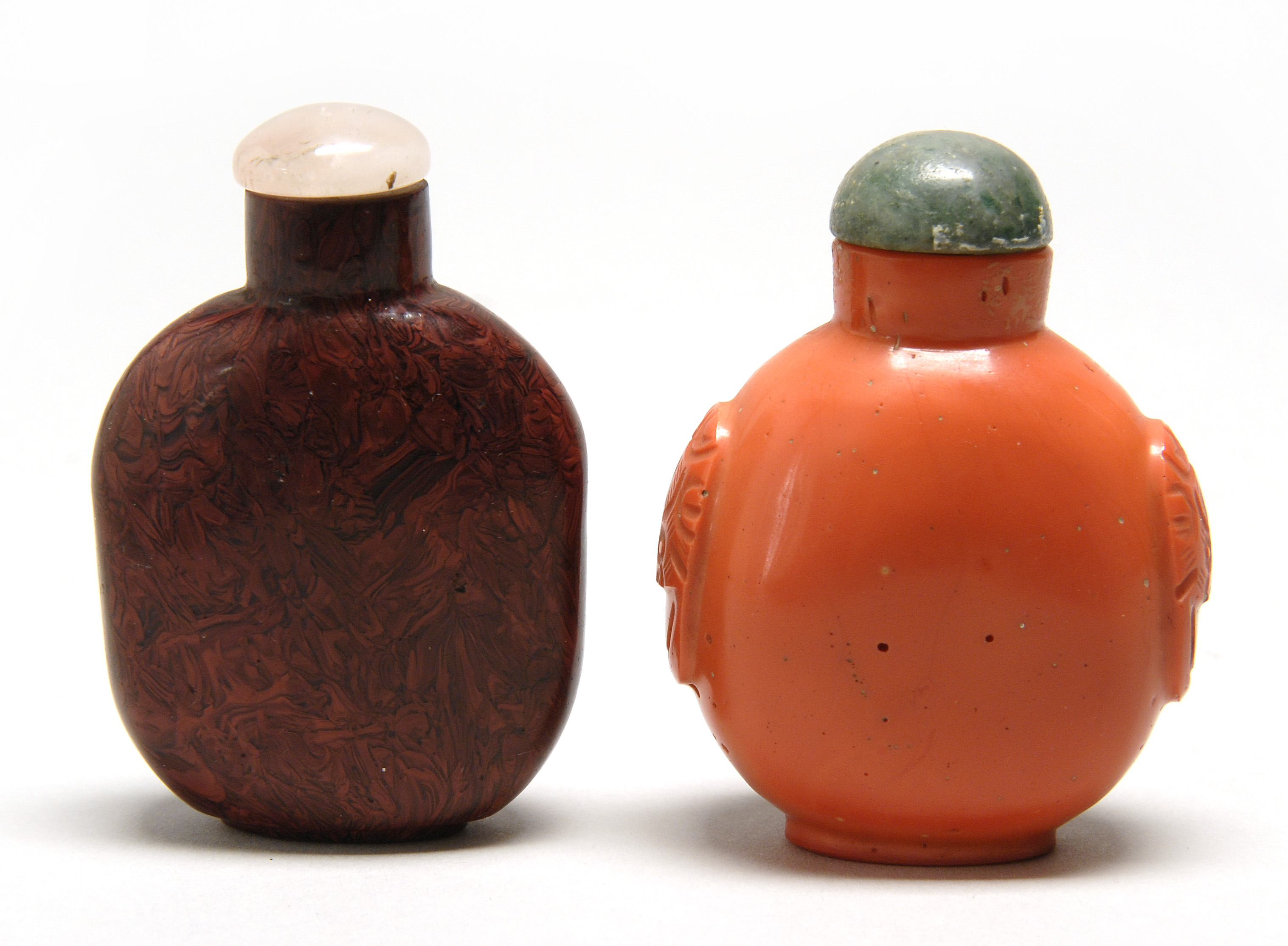 Appraisal: TWO GLASS SNUFF BOTTLES Ovoid form simulating coral Height cm