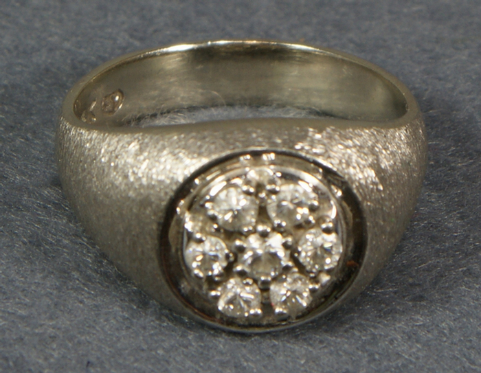 Appraisal: K WG mans diamond ring center stone surrounde by diamonds