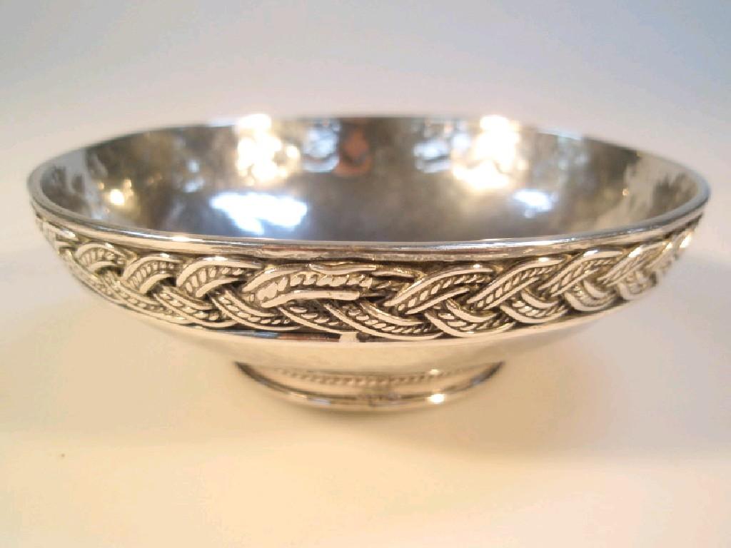 Appraisal: A late George VI Arts and Crafts style circular bowl