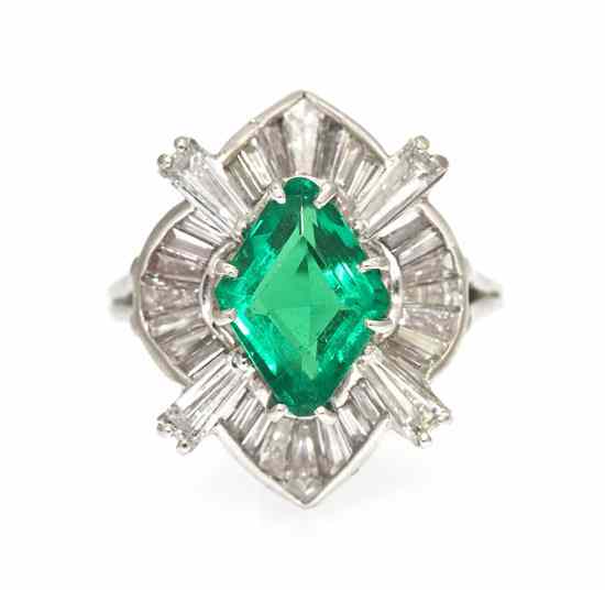 Appraisal: A Platinum Emerald and Diamond Ring containing one lozenge shape