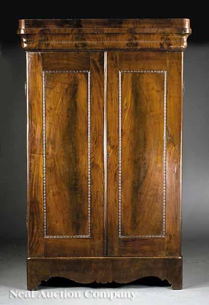 Appraisal: An American Late Classical Mahogany Armoire c pedimented ogee molded