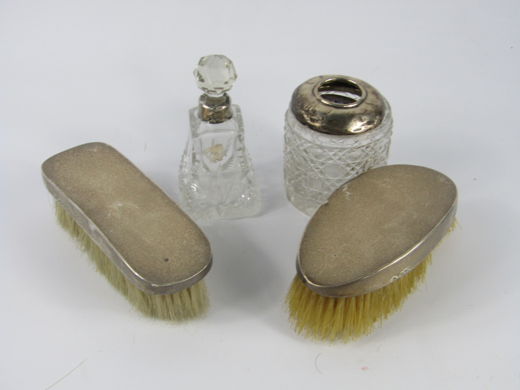 Appraisal: A George V cut glass scent bottle with silver mount