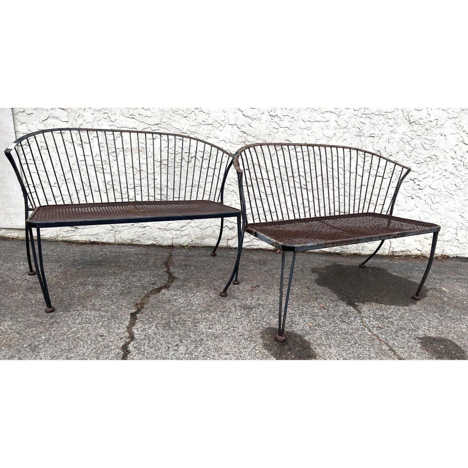 Appraisal: Pair Wrought Iron Garden Benches Curved backs Some rust Dimensions