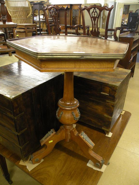 Appraisal: A Continental walnut and beech occasional table with an hexagonal