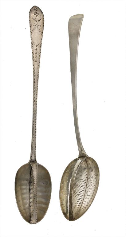 Appraisal: AN IRISH GEORGE III STRAINING SPOON of bright cut pointed