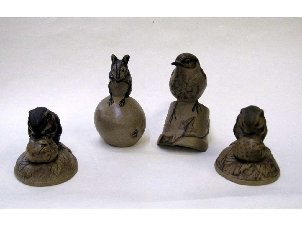 Appraisal: Four Poole stoneware animal figures to include two mice eating