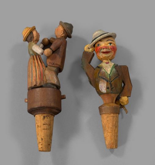 Appraisal: Amusing Pair of Bavarian Carved Wooden Bottle Stoppers first quarter