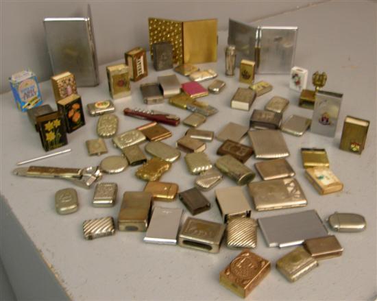 Appraisal: Collection of cigarette cases match box holders and other smokers