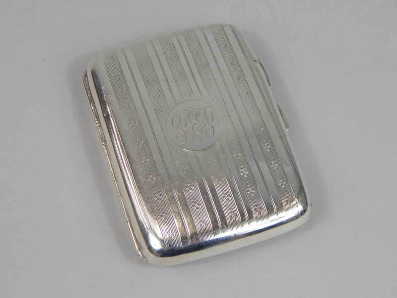 Appraisal: A George V engine turned silver small cigarette box decorated