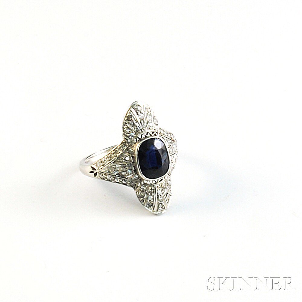 Appraisal: Platinum Sapphire and Diamond Cocktail Ring the sapphire measuring x