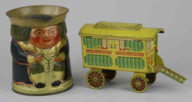 Appraisal: TOBY JUG GYPSY WAGON BISCUIT TINS Both done in lithographed