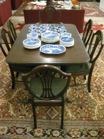 Appraisal: Mahogany Table and Six Chairs double pedestal shield back chairs