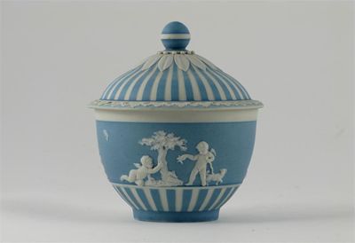 Appraisal: A Wedgwood jasperware bowl and cover decorated with two putti