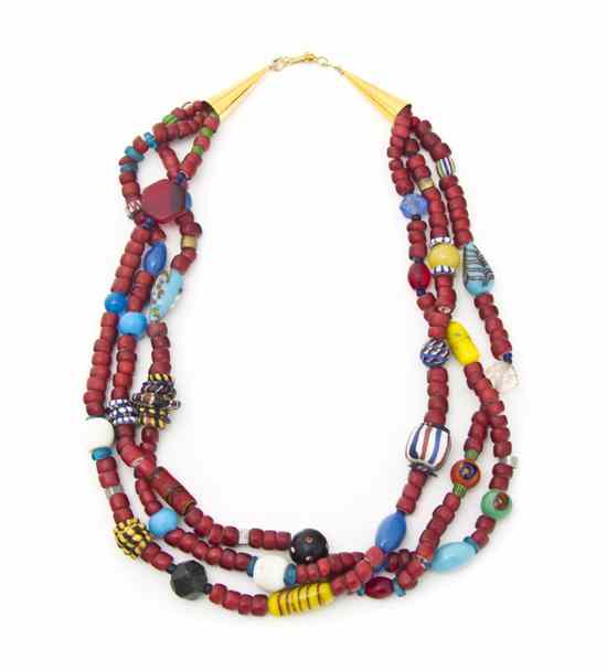 Appraisal: A Mixed Trade Three Strand Necklace with white heart red