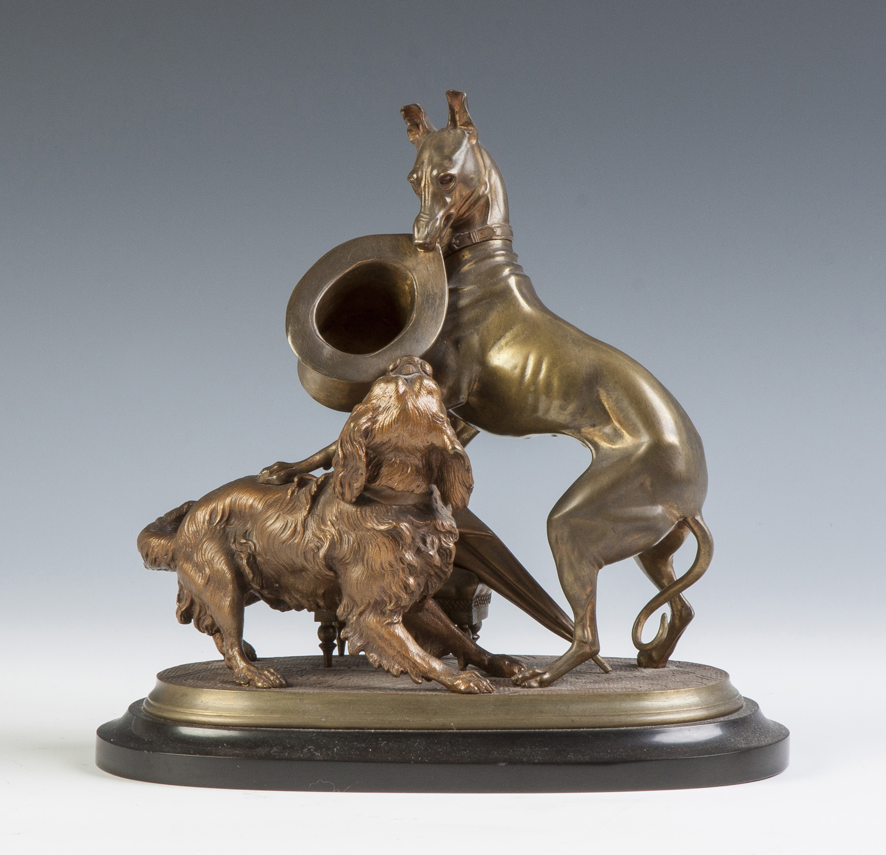 Appraisal: Bronze Sculpture of two dogs fighting over a hat th