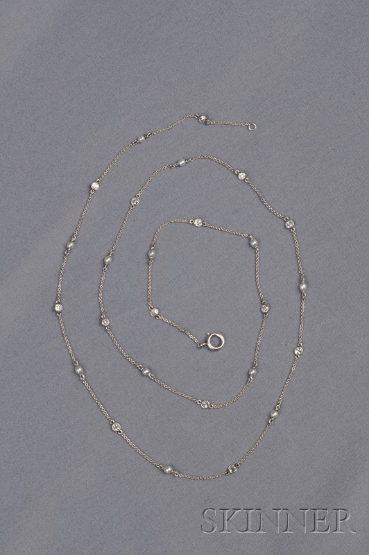 Appraisal: Edwardian Platinum Seed Pearl and Diamond Chain of alternating spectacle-set