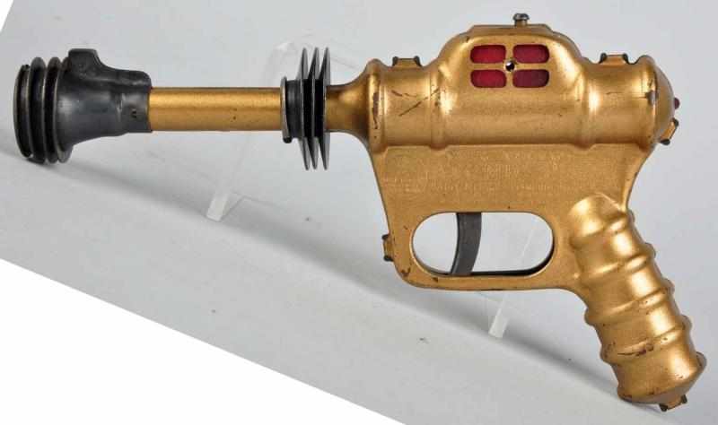 Appraisal: Daisy Buck Rogers Atomic Pistol Toy Gold version Some scratching