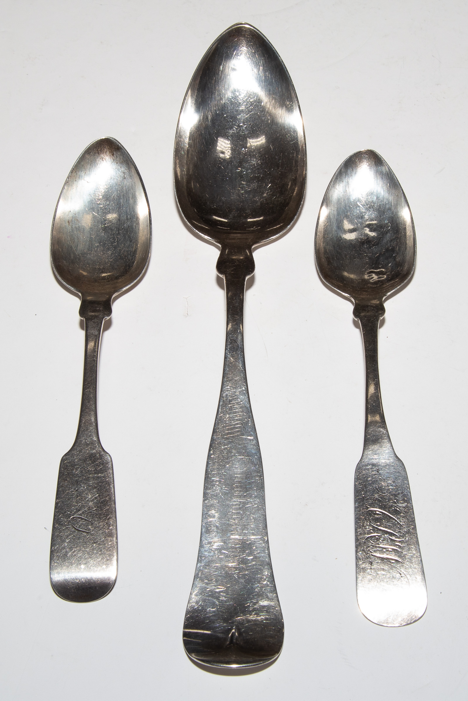 Appraisal: THREE AMERICAN COIN SILVER SPOONS Including a dinner spoon by