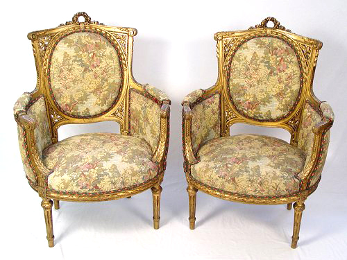 Appraisal: PAIR ORNATELY CARVED LOUIS XVI STYLE PARLOR CHAIRS Early th