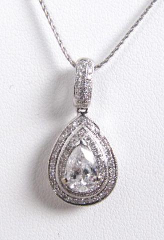 Appraisal: K White Gold Pear Shaped Diamond Pendant with round accent