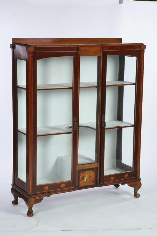 Appraisal: ART NOUVEAU DISPLAY CABINET Mahogany veneered two-door cabinet having glass