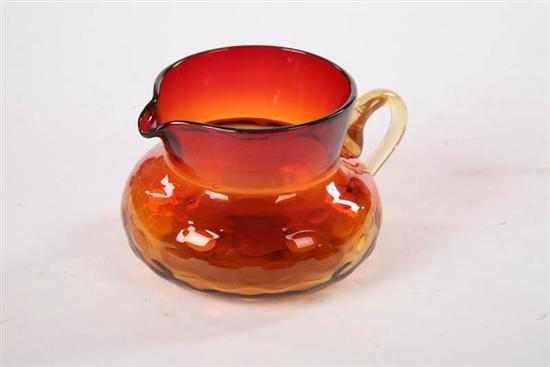 Appraisal: AMBERINA GLASS CREAMER Bulbous base with a flared top and