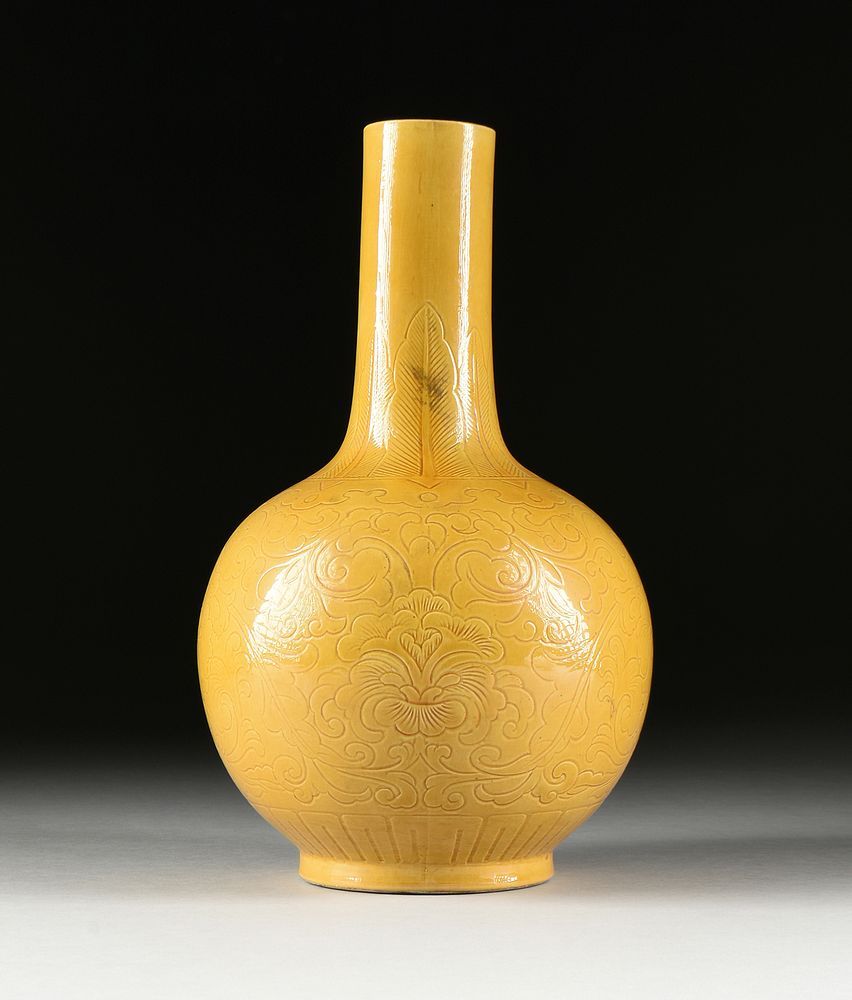 Appraisal: A QING DYNASTY STYLE EGG YOLK YELLOW INCISED BOTTLE VASE