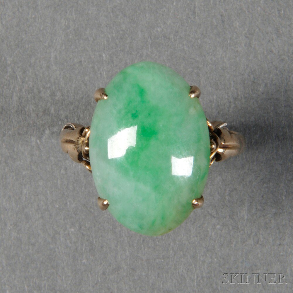 Appraisal: Gold Ring with Marquise Jadeite Inset an elliptical cabochon jadeite