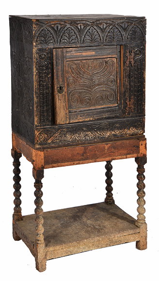 Appraisal: A TH CENTURY STYLE OAK CUPBOARD with chip carved decoration