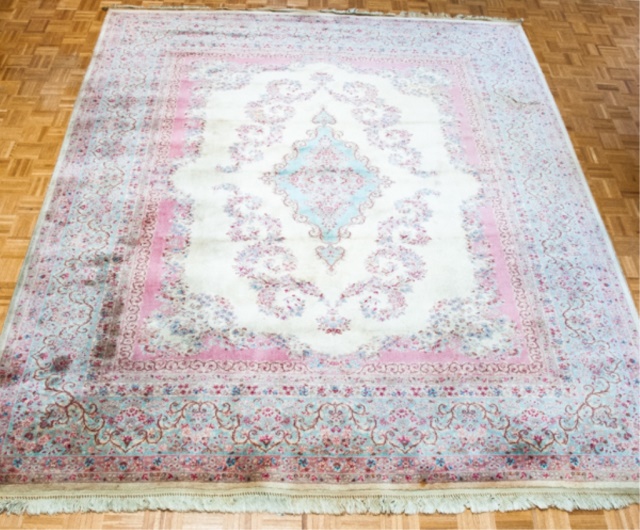 Appraisal: Karastan Kirman Carpet Cream center with blue and red medallion