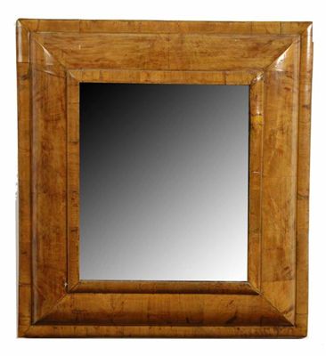 Appraisal: A William and Mary walnut cushion frame mirror with a